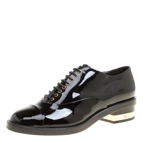 black chanel oxfords|Chanel clothing store.